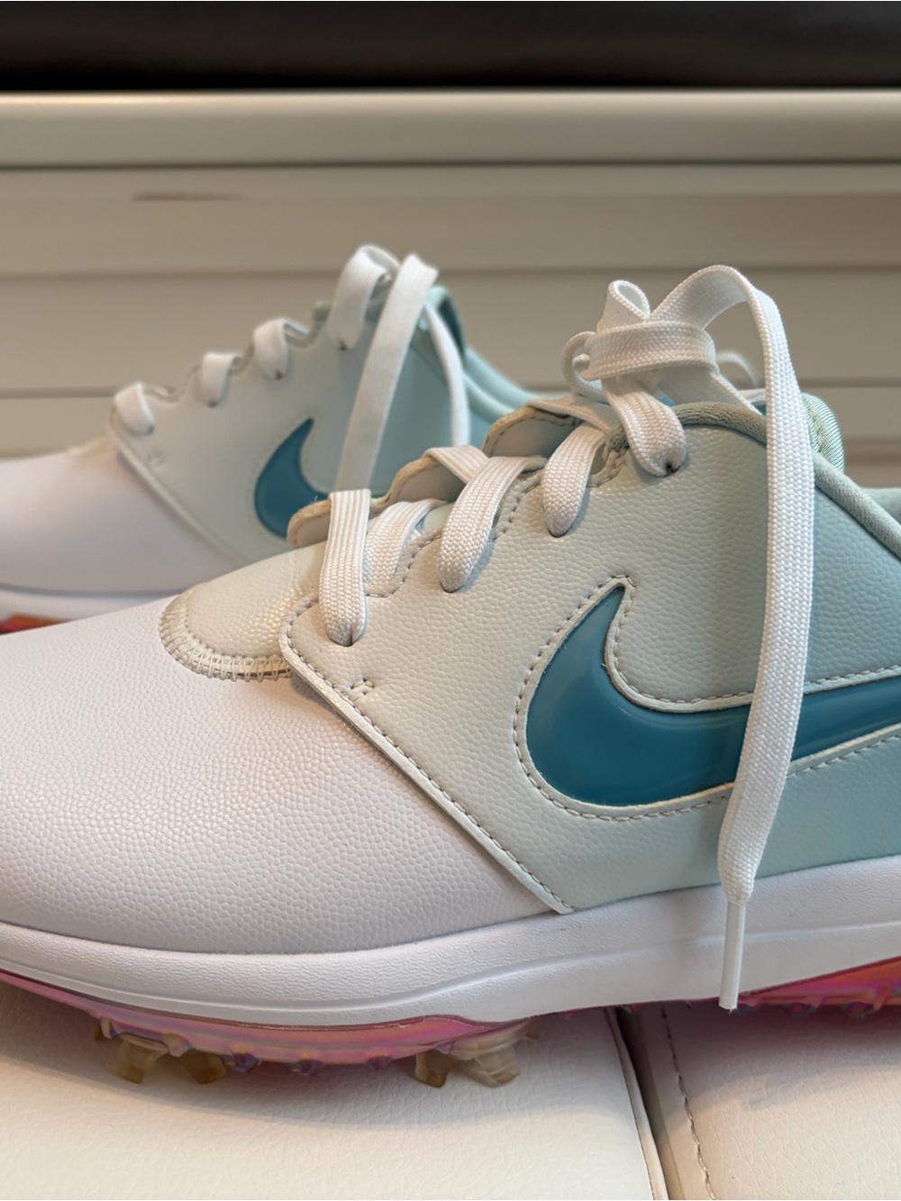 Nike White Sneakers with Teal Swoosh